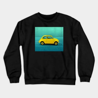 Classic yellow Fiat 500 on an aqua street Crewneck Sweatshirt